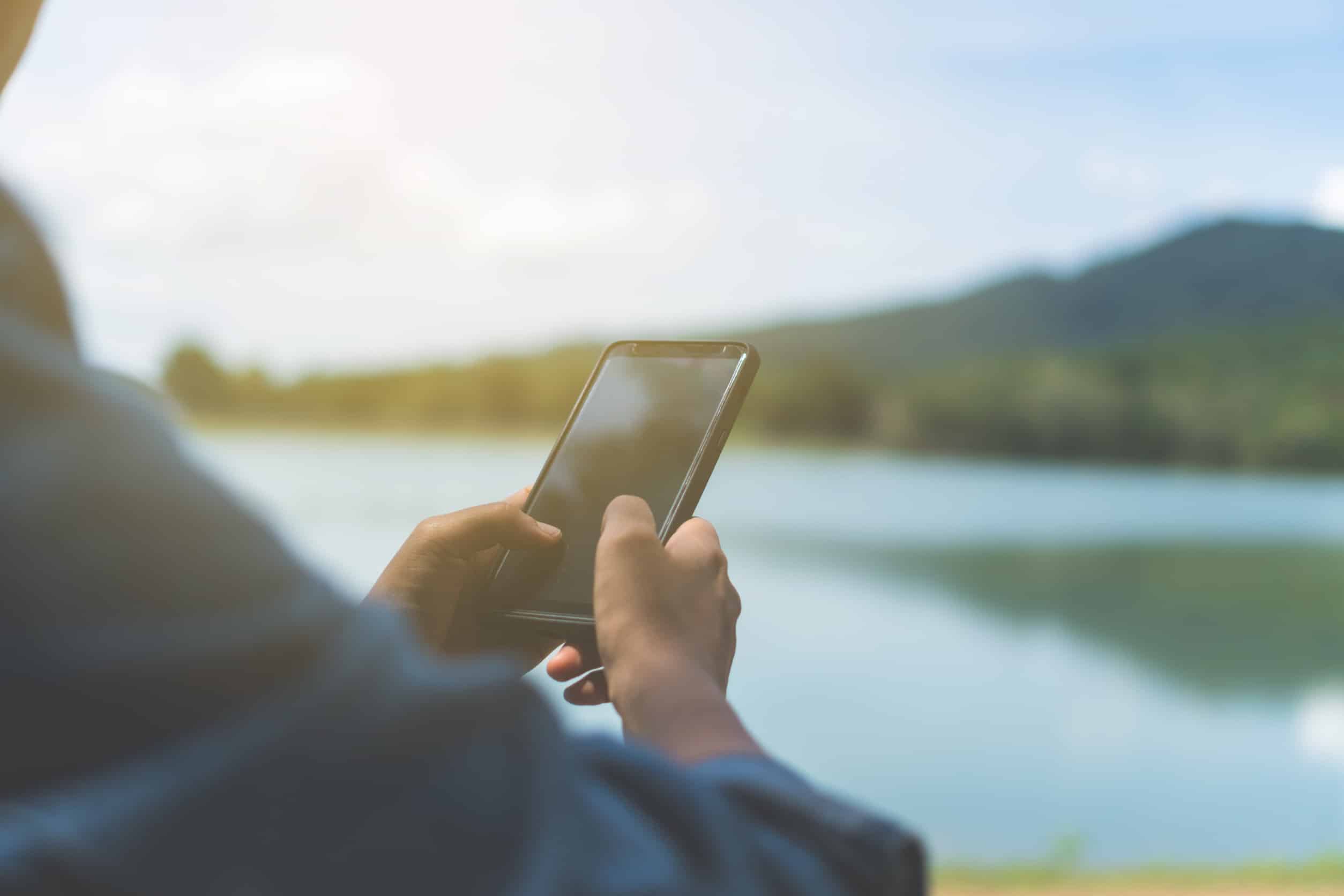 Woman hand using smartphone